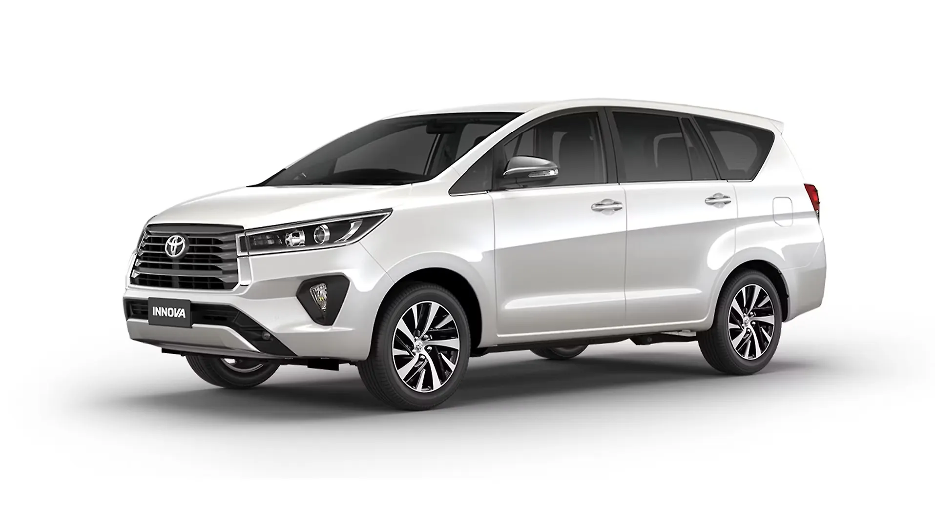 White Toyota Innova Crysta
